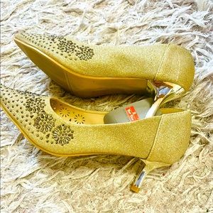 Woman’s embellished party shoe with tag attached
